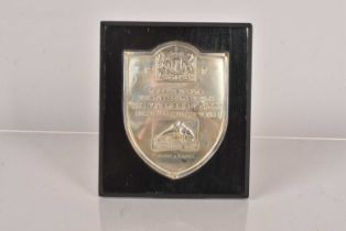 A 1937 mounted silver HMV Plaque,