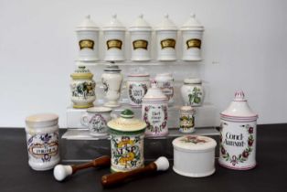 A group of five white ceramic Apothecary jars,