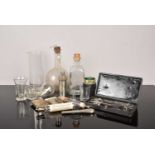 An assortment of Medical Instruments and Glassware,