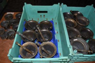 A group of 14 medium sized reproduction pestle and mortars,