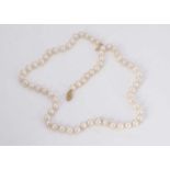 A string of uniform knotted cultured pearls,