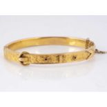 A Victorian 9ct gold buckle bangle,