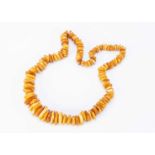 A Baltic amber pebble necklace,