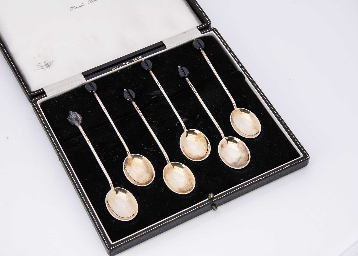 A c1960s set of six silver gilt and enamelled coffee bean spoons in a Harrods case, - Image 2 of 2