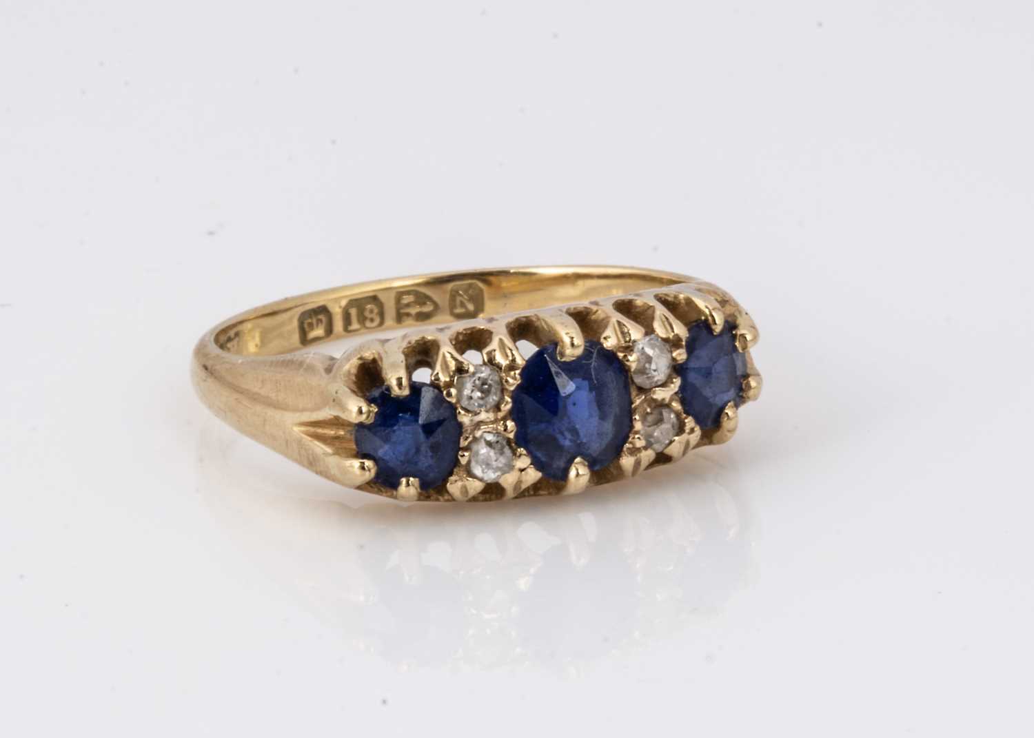 A Victorian 18ct gold sapphire and diamond dress ring,