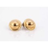 A pair of domed 18ct gold stud earrings,