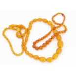 A graduated string of toffee coloured Baltic oval amber beads,