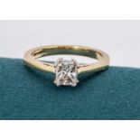 An 18ct gold diamond solitaire ring,