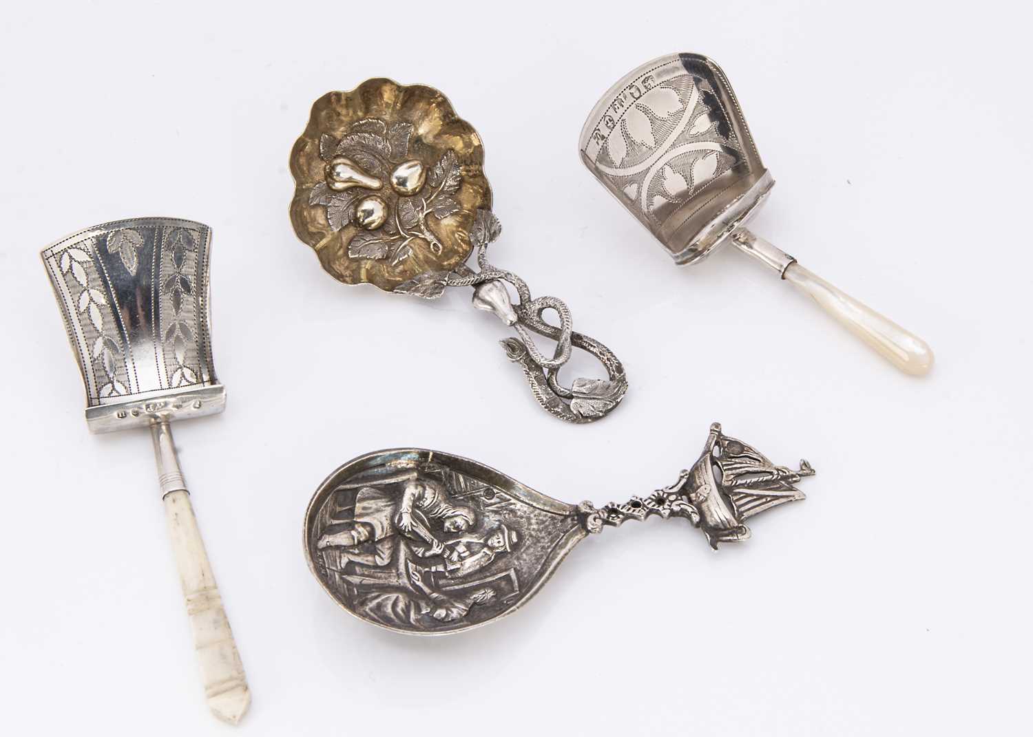Four Georgian and later silver tea caddy spoons,