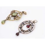 Two 9ct gold Art Nouveau open work oval pendants,