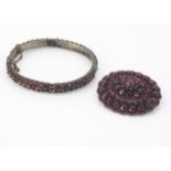 A Bohemian 19th century oval garnet bangle,