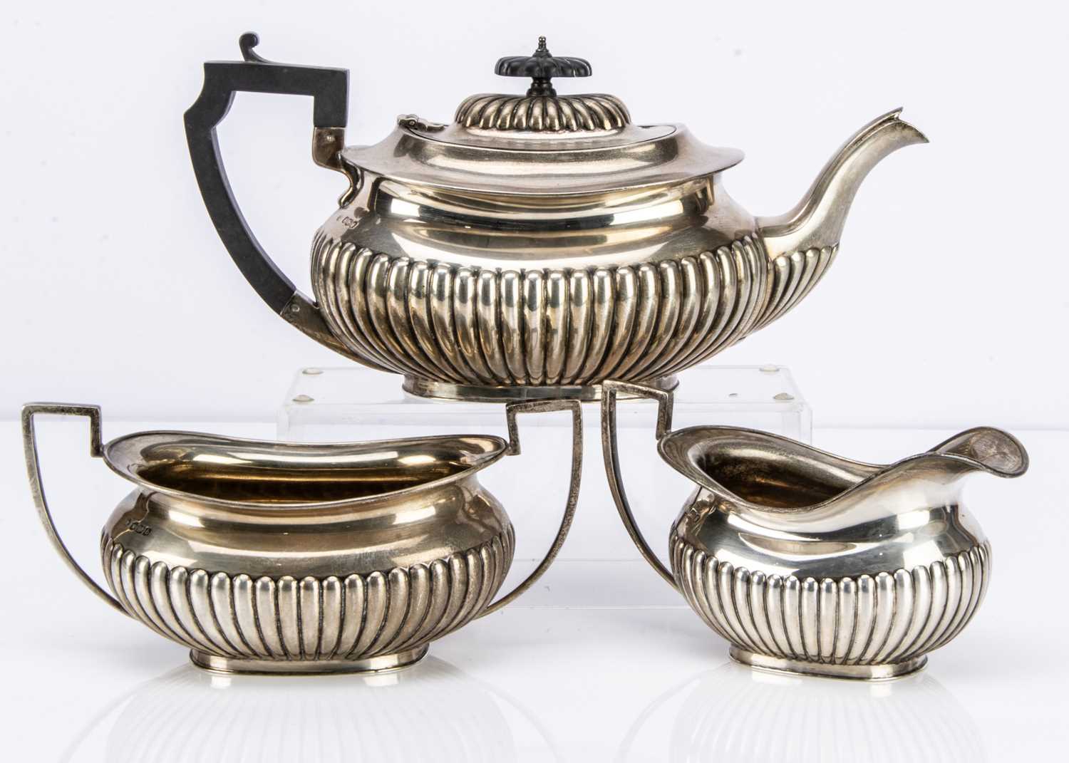 A George V silver three piece tea set by John Round & Son Ltd,