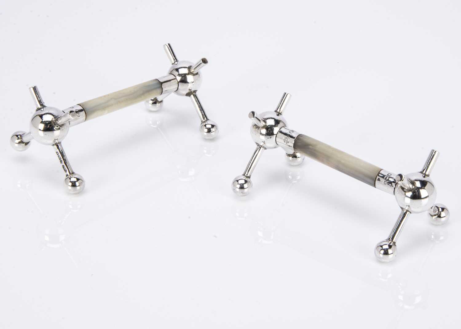 A pair of George V period silver and mother of pearl knife rests by William Hutton & Sons