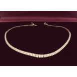 An 18ct yellow gold fringe necklace,