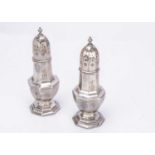 A large pair of George V silver sugar sifters,