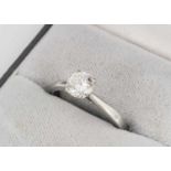 A diamond solitaire platinum ring,