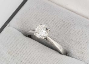 A diamond solitaire platinum ring,