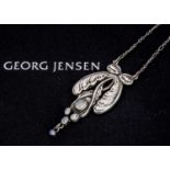 An early 20th century Georg Jensen no 3 silver moonstone pendant,