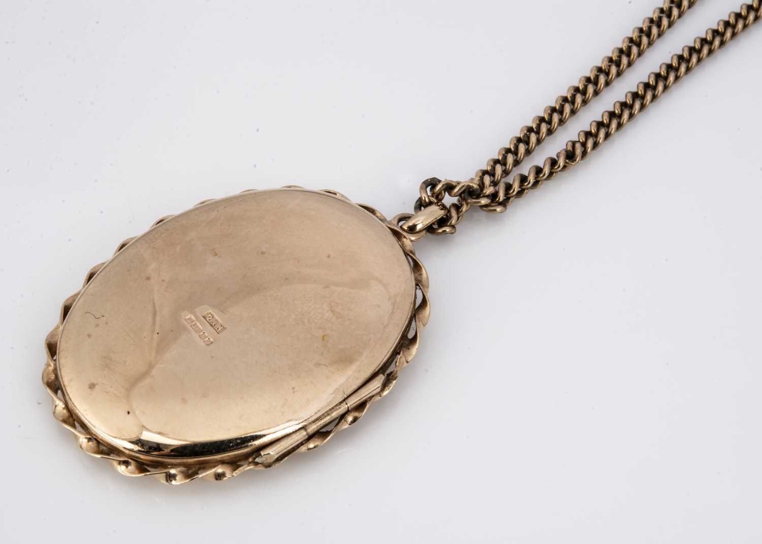 A 9ct gold oval engraved locket, - Image 3 of 3