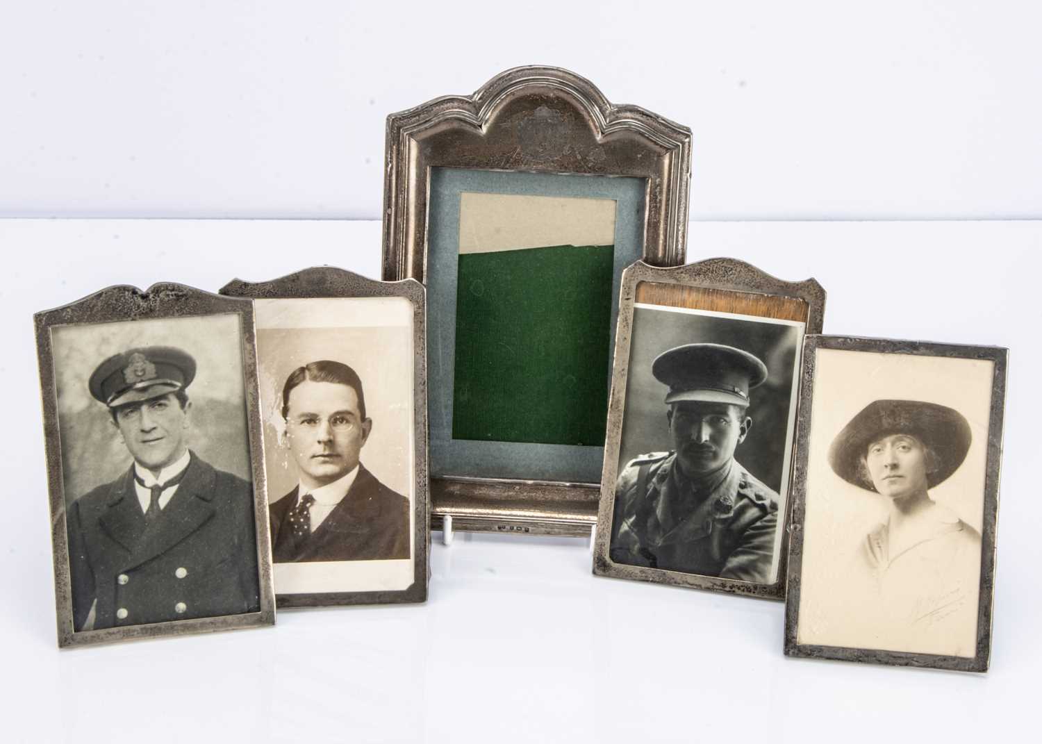 Five early 20th century silver mounted photograph frames,
