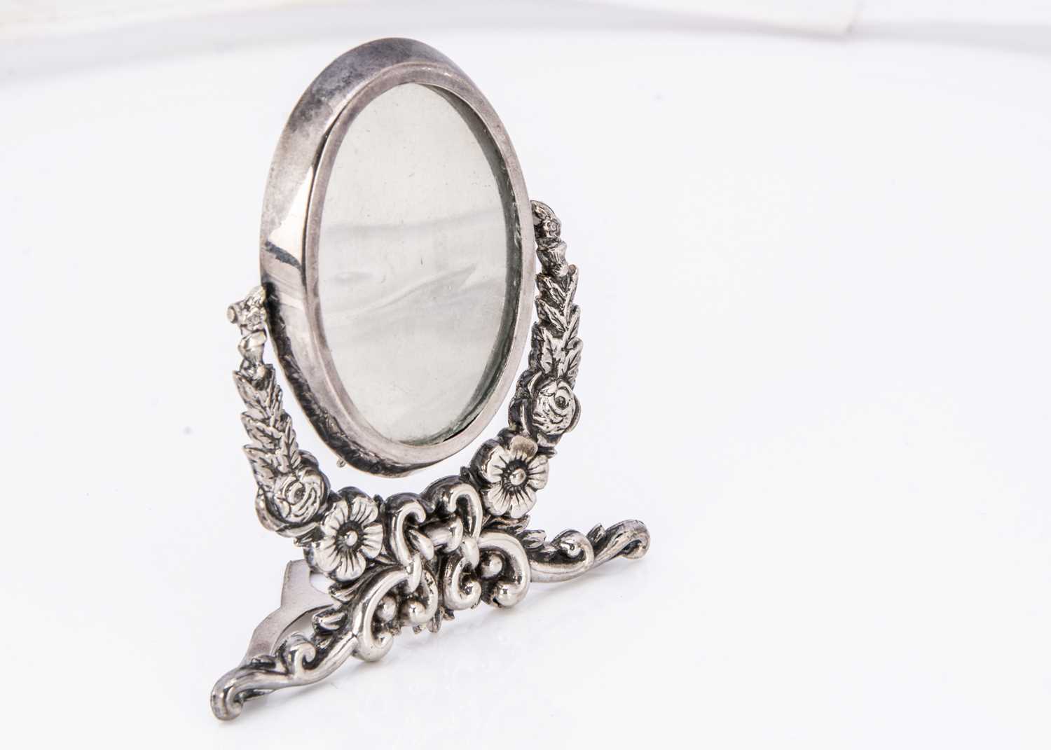 A late Victorian silver miniature dressing table mirror,