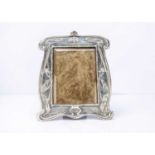 An Arts & Crafts silver mounted photograph frame,