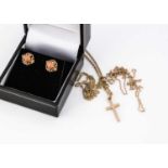 A pair of coral and 9ct gold scroll ear studs,