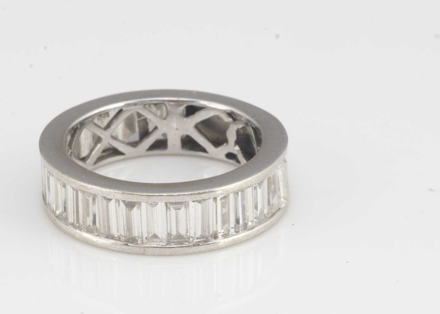 A continental white gold diamond baguette channel set three-quarter eternity ring, - Image 2 of 2