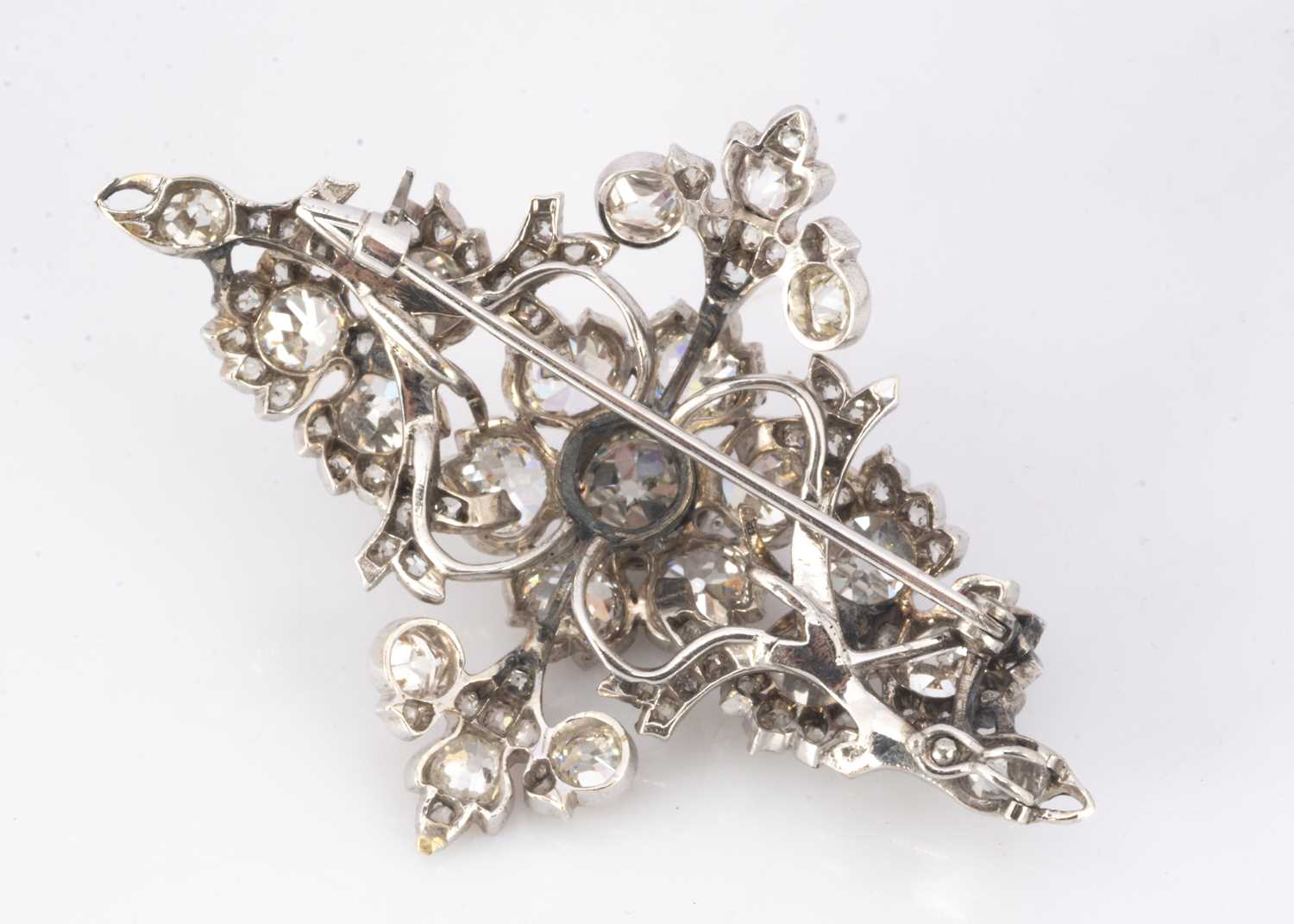 A late 19th and early 20th century navette shaped diamond cluster brooch, - Image 2 of 2