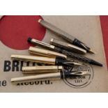 Four Sheaffer pens,