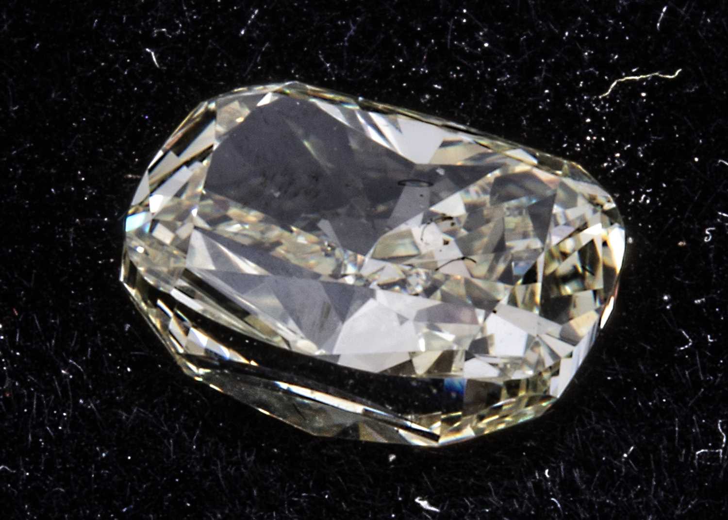 A GIA certificated 'Fancy colour' loose diamond,