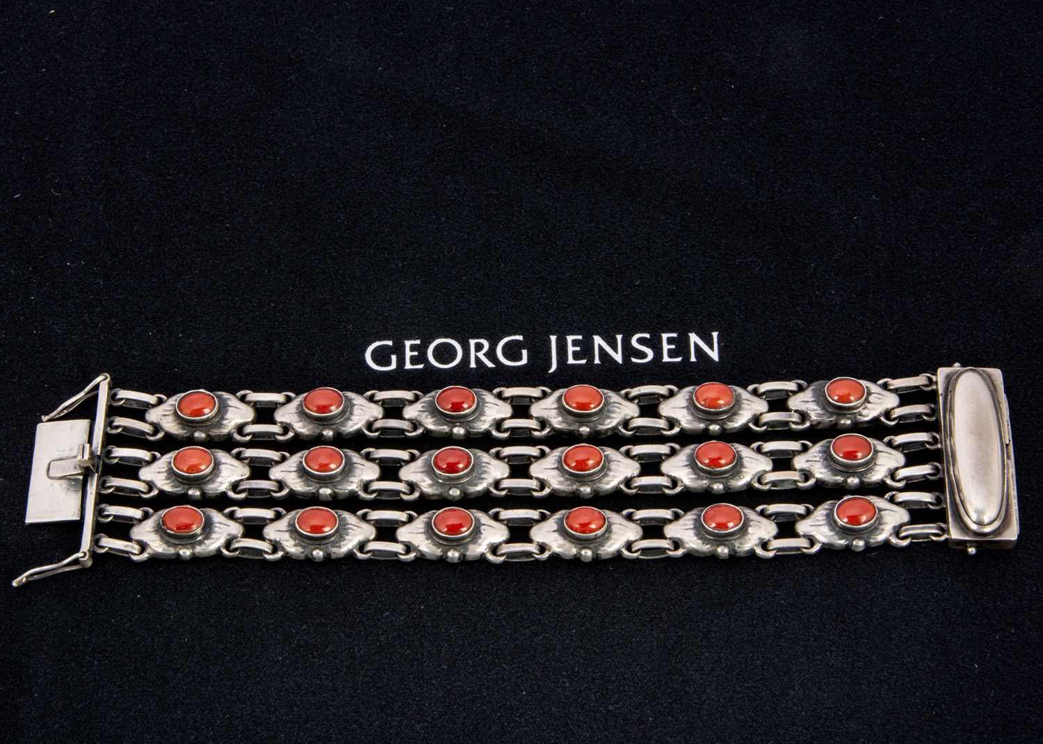 An early 20th century Georg Jensen coral three strand bracelet no. 15,