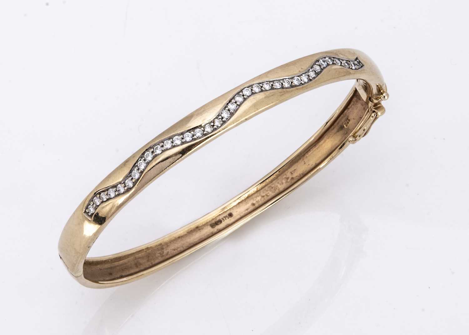 A yellow metal bangle set with CZ's, - Image 2 of 2