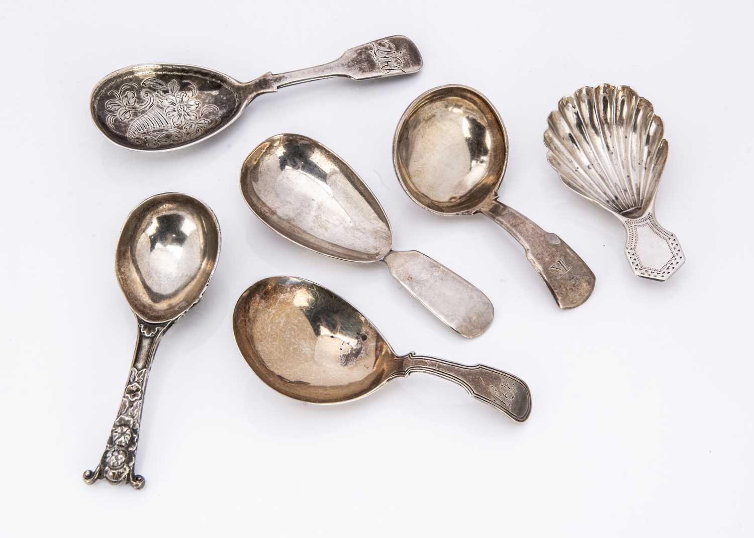 A collection of six Georgian and Victorian silver tea caddy spoons,
