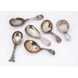 A collection of six Georgian and Victorian silver tea caddy spoons,