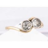 A diamond crossover 9ct gold dress ring,