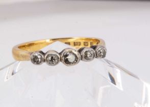 A 22ct gold wedding band converted to a five stone diamond ring,