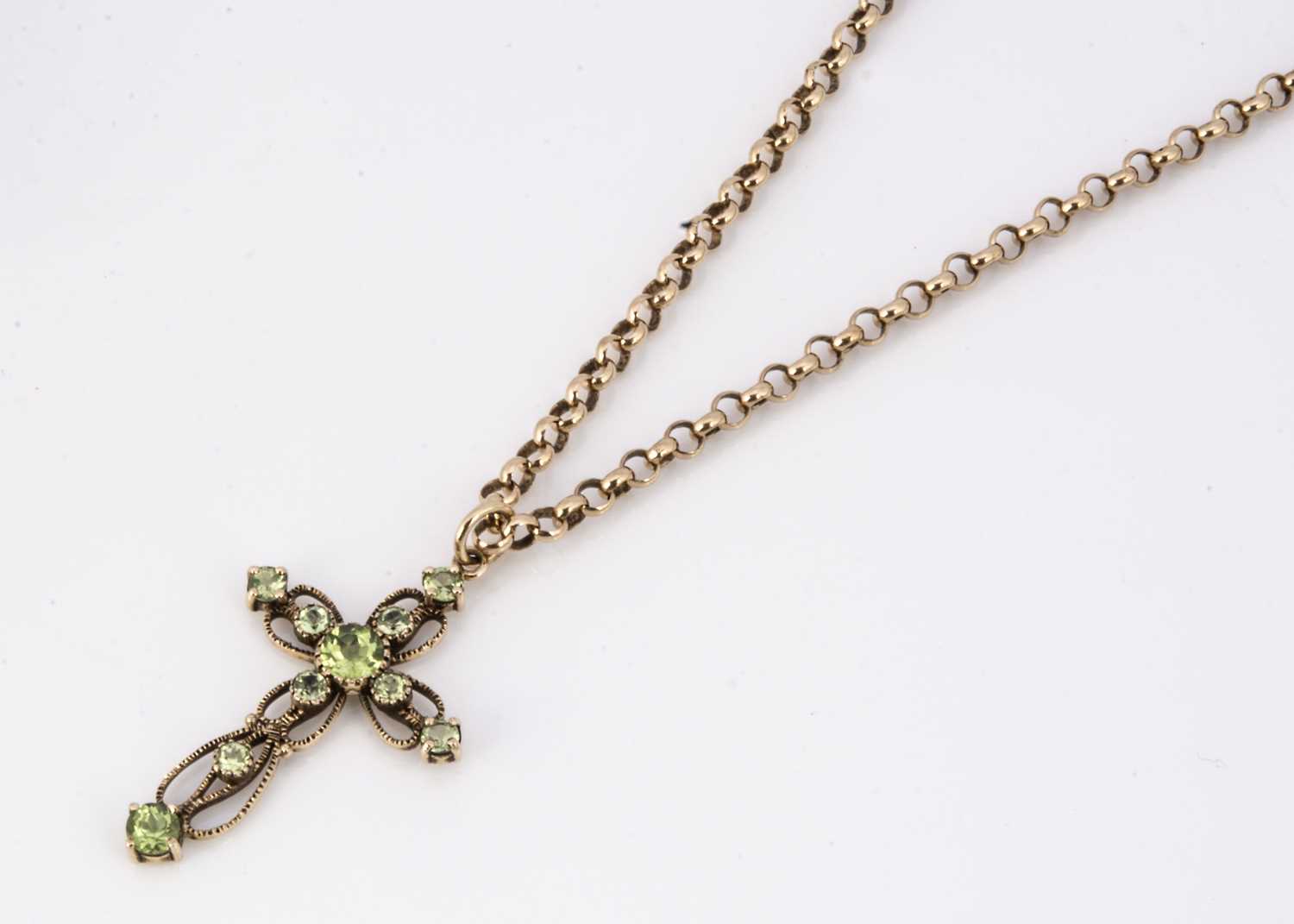 A 9ct gold peridot openwork cross,