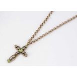 A 9ct gold peridot openwork cross,