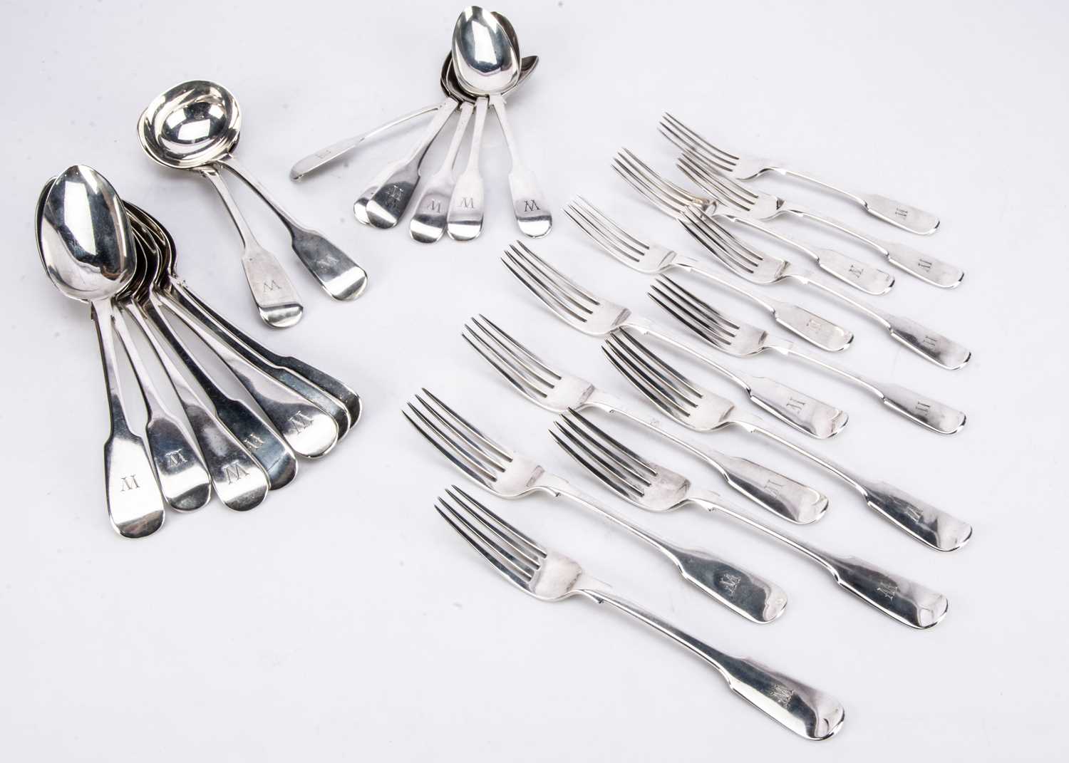 A harlequin late Georgian and Victorian silver fiddle pattern spoon and fork set,
