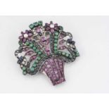 An Indian white metal and multi gem set floral brooch,