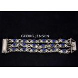 An early 20th century George Jensen silver and Lapis lazuli three strand no.15