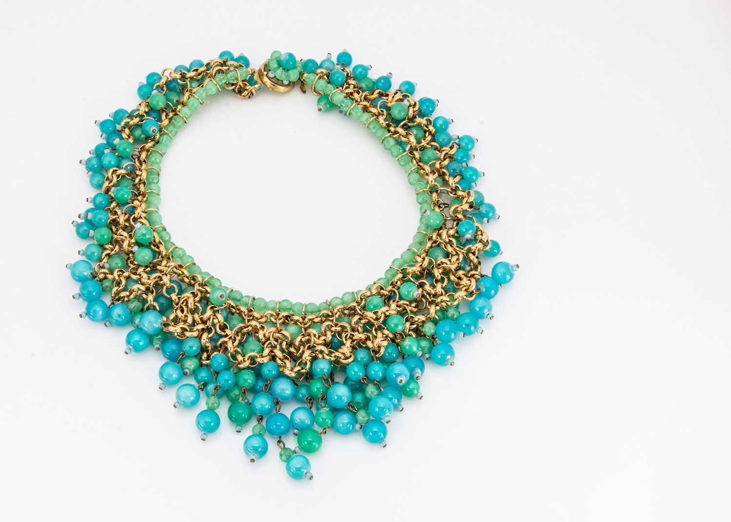 A 1960s fringe bead and gilt metal costume necklace,