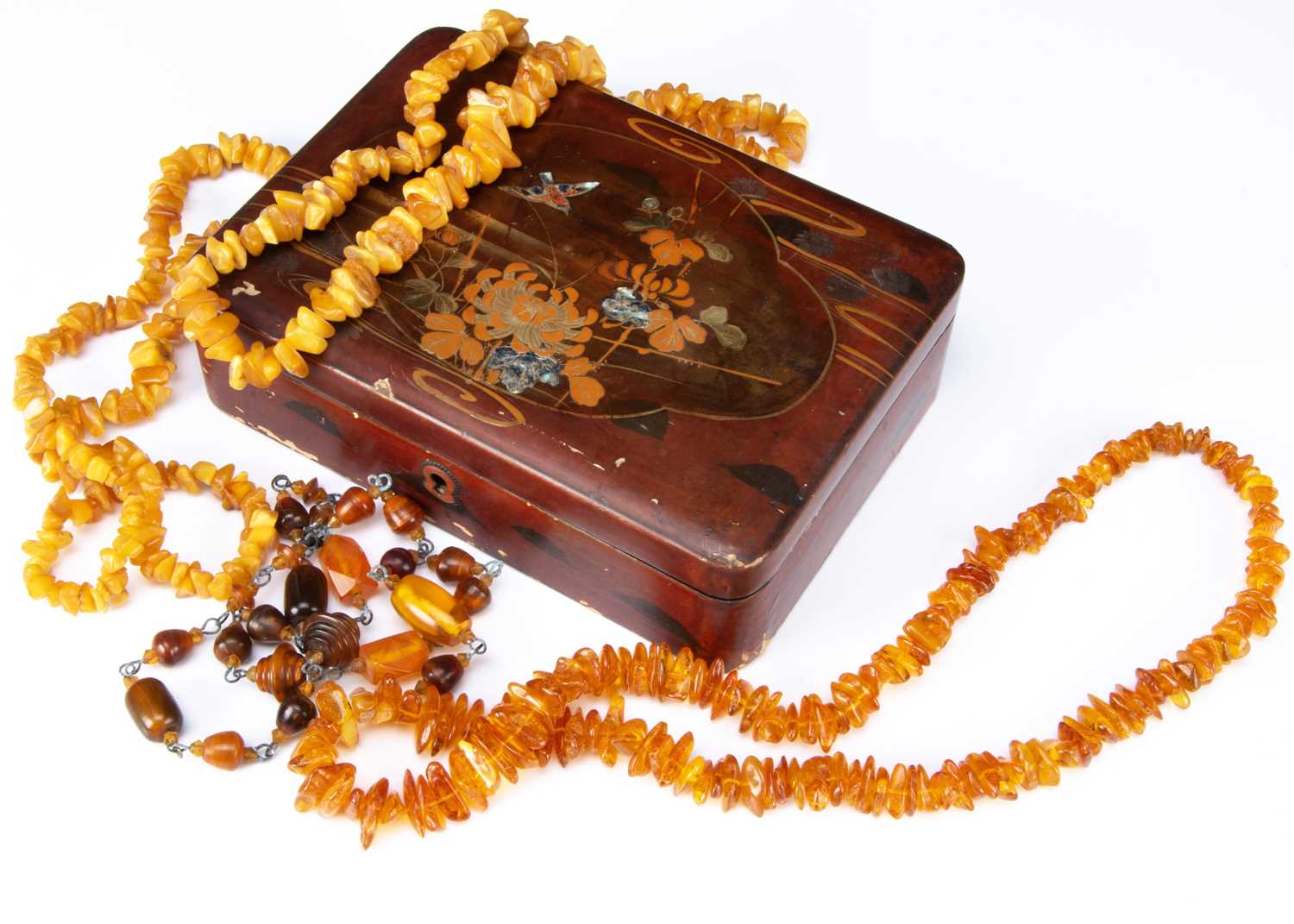 A collection of amber necklaces,