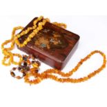 A collection of amber necklaces,