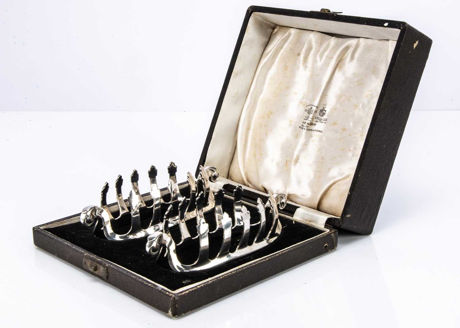 A pair of nice 1970s silver toast racks by Adie Bros,