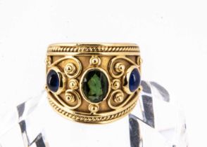 A continental 18ct gold tourmaline and sapphire dress ring,