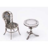 A miniature table and chair,