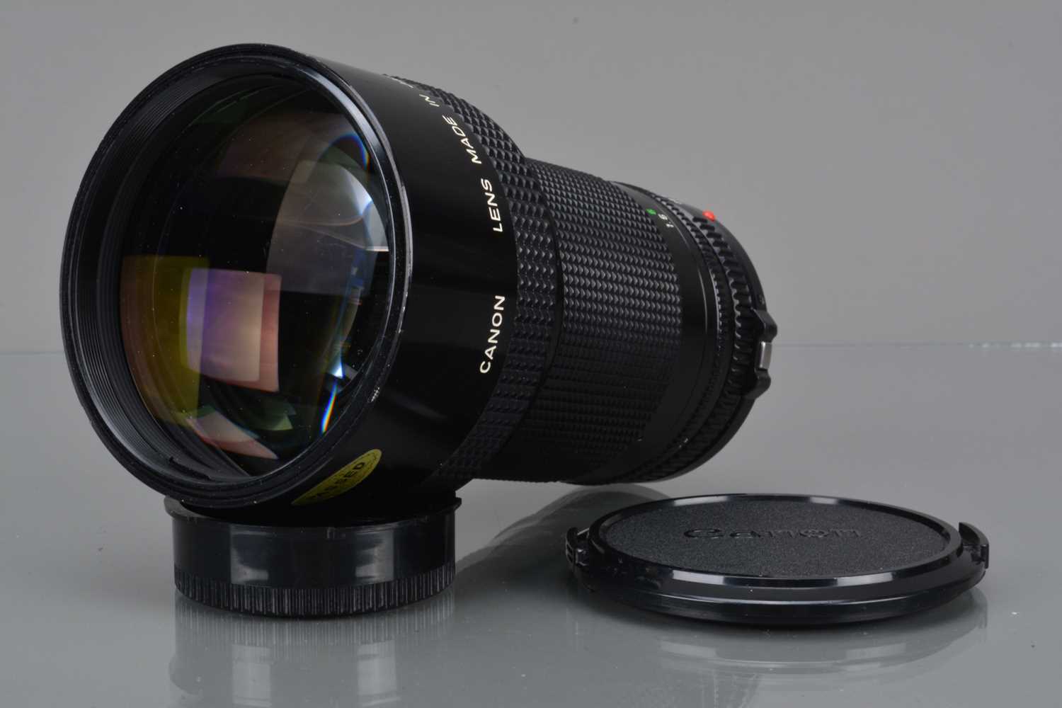 A Canon FD 200mm f/2.8 Lens,