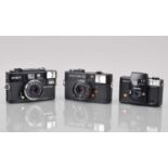 Three Compact Cameras,